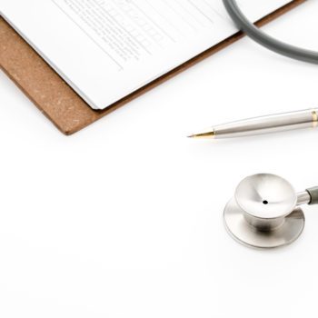 Stethoscope with Pen on Patient information