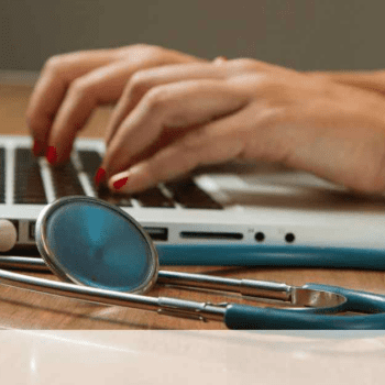 Doctor Searching For Billing Expert on Laptop